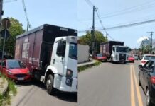 Acidente de trânsito deixa carro imprensado por caminhão; veja vídeo