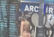 Vídeo: Mulheres seminuas chamam atenção durante forte chuva que deixou ruas alagadas