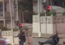 VÍDEO: Policial supostamente irritado com o resultado das eleições, tenta chutar motociclista e cai no chão durante confusão em Lábrea